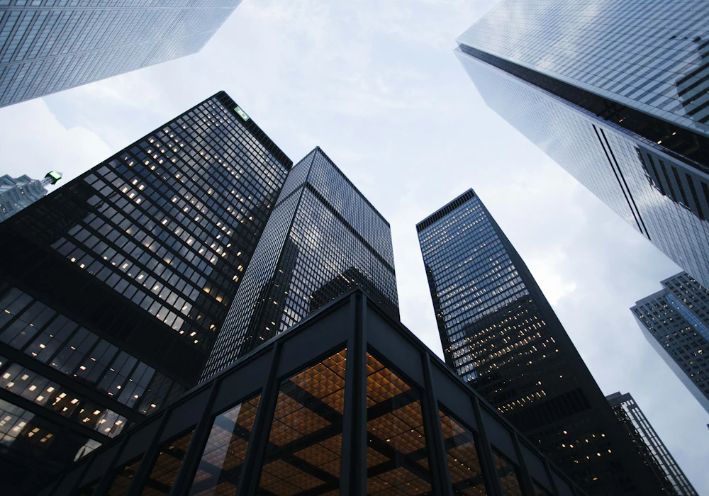 Glass office buildings photographed from street level
